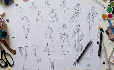 Fashion designer stylish drawings sketches textile fabric material Costume. Designer creative...