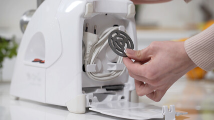 Cutting plates for obtaining different consistencies of minced meat. Electric mincer machine for...