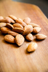 Almonds on a wooden cutting board