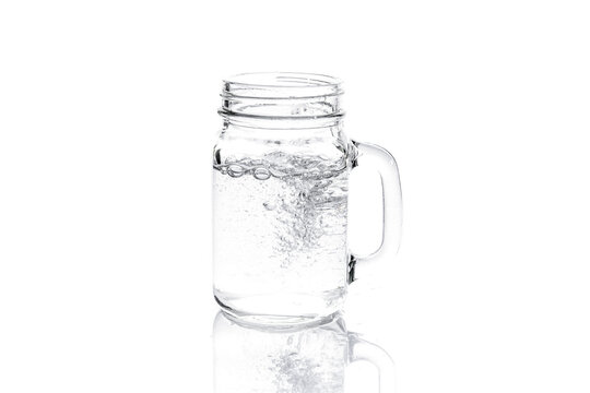 mason jar with water isolated on white
