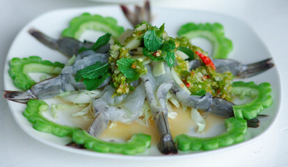 Shrimp in fish sauce, hot and spicy, seafood thai (spicy salad shrimp in fish sauce) Blurred and selective focus, Still life, image and Still Life food.
