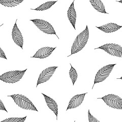 A pattern of decorative elements made of tree leaves. Hand ink drawing.