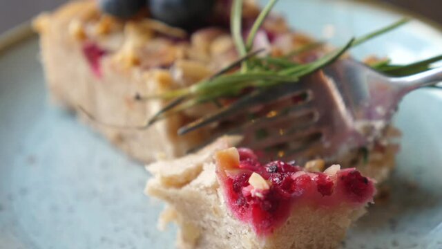 Close Up Of Taking A Bite Of Pie With Fork.