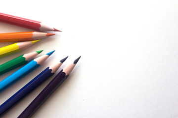 rainbow colored pencils isolated on white background 
