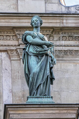 Obraz premium Sculpture of ancient Paris Fountain Saint-Michel at Place Saint-Michel. France. Fountain Saint-Michel constructed in 1858 - 1860 during French Second Empire. Paris, France. 