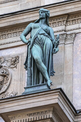 Fototapeta na wymiar Sculpture of ancient Paris Fountain Saint-Michel at Place Saint-Michel. France. Fountain Saint-Michel constructed in 1858 - 1860 during French Second Empire. Paris, France. 