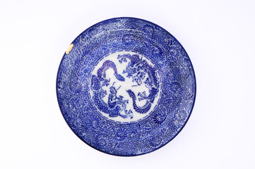 Japanese kintsugi ceramic plate restored with real gold, Antique traditional pottery.