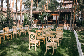 Wedding ceremony in the woods in a rustic style