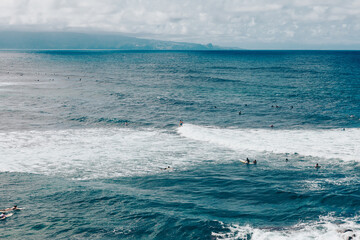 surfing the waves on Maui Hawaii