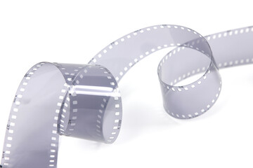 35mm film strip in white background, copy space cinema word with place for text,  film strip for festival, brochure, poster, banner or flyer. Film entertainment concept.
