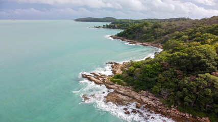 Fototapeta premium View from above, stunning aerial view of a beautiful beach bathed by a turquoise sea in summer. Samed, Thailand.