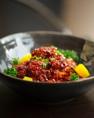 Asian marinated chicken in spicy sauce with daikon