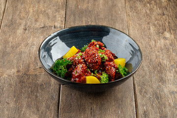 Asian marinated chicken in spicy sauce with daikon