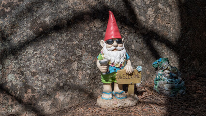 A happy garden gnome on vacation, holding a margarita next to a welcome sign. - Powered by Adobe