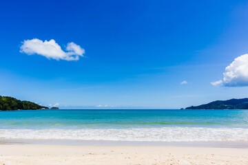Fototapeta na wymiar Tropical beach with blue sky at Patong Beach, Phuket, Thailand.