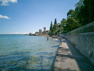Shady walk on the edge of Lake Garda in Sirmione