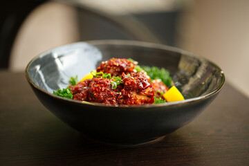 Asian marinated chicken in spicy sauce with daikon