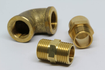 Brass fitting isolated on white background.