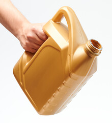 Hand hold open yellow jerrycan