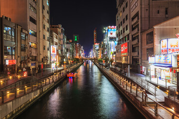 Naklejka premium Osaka, Japan, November 4, 2016. Osaka Japan walking street with glico advertising landmark at night