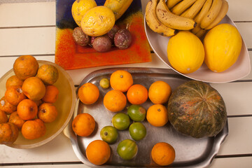 banana, melon, tangerine, passion fruit, papaya, pumpkin, lemon, orange