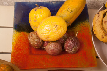 banana, melon, tangerine, passion fruit, papaya, pumpkin, lemon, orange