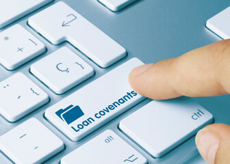 Loan covenants - Inscription on Blue Keyboard Key.