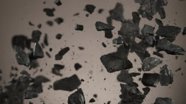 Super slow motion of collision of coal pieces. Filmed on high speed cinema camera, 1000fps.