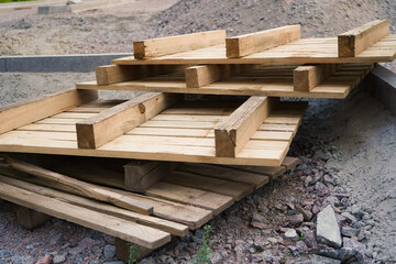 Close-up old wooden pallets.Wood pallet in factory area use for carry material and product supply to customers.