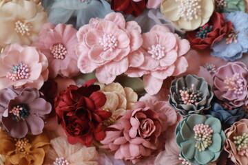 Artificial flowers made out of fabric in beautiful pastel colors