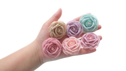 Artificial flowers made out of crepe or chiffon fabric in beautiful pastel colors