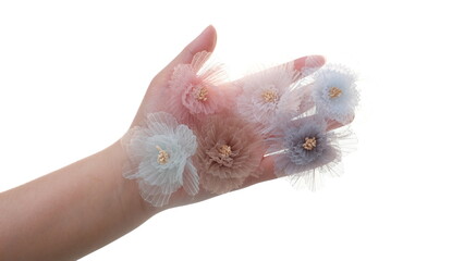 Artificial flower made out of tulle fabric in beautiful pastel colors