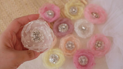 Artificial flowers made out of organza fabric in beautiful pastel colors