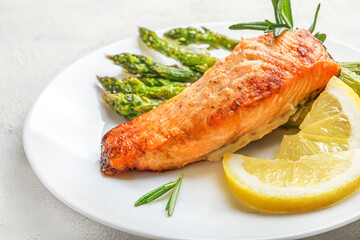 Delicious lunch, baked salmon with asparagus