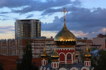 Fototapeta premium golden domes of the church overlooking the city