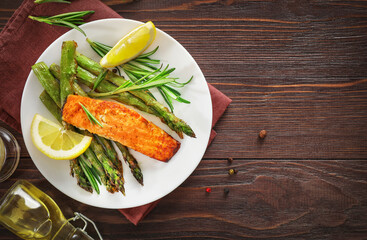 Delicious lunch, baked salmon with asparagus