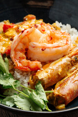 Asian dish curry with langoustines and hikari rice