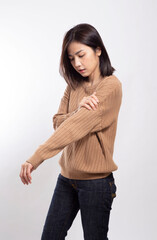 The Asian woman standing on the white background.