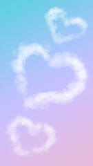 Watercolor art white clouds in the form of hearts on a multicolor gradient background