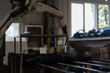 robot arm working in factory
