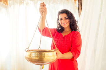 young woman doing healthcare indian traditional treatment in Ayurveda body constitution centre