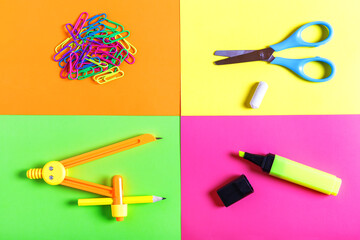 Various school supplies on a colorful background. Back to school concept. Learning and education concept. Stationery store concept. Bright creative school background. Top view, flat lay.