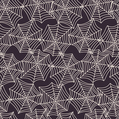 Seamless vector pattern of decorative ornamental spider net on dark background