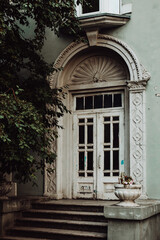  Old porch with arch and stucco