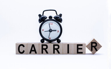 Business concept: Carrier Word on Wooden Blocks and alarm-clock. Time is money. Time-limit.