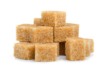 cane brown sugar cubes on white background isolation