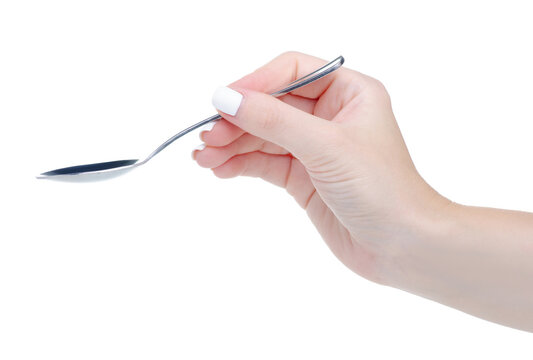 Empty teaspoon in hand on white background isolation