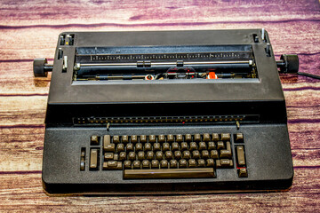 Fototapeta na wymiar Vintage Old Time Electric Typewriter