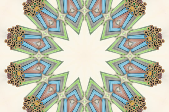 coloured Pencils kaleidoscope with soft focus 12 pointed star and centre copy space