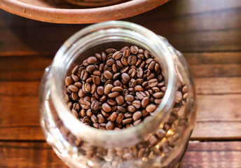 Fototapeta premium Roasted Coffee, Photographed on a cofee farm in Ubud, Bali, Indonesia. Coffee is produced from beans that have been eaten and defecated by civets. Kopi Luwak
